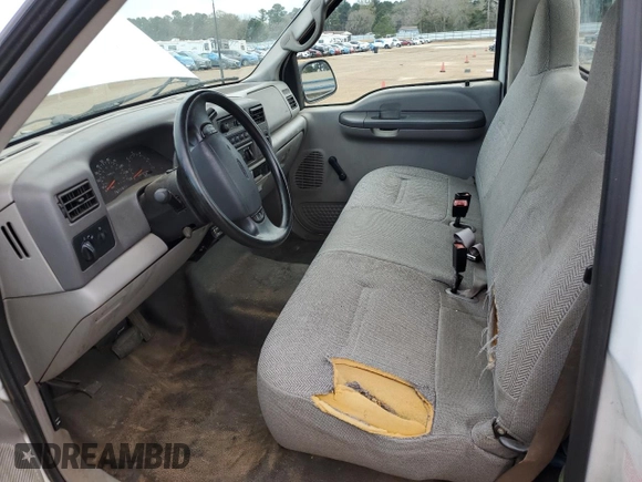 2001 Ford F-250 XL with VIN 1FTNF20L61EB61984, listed as a Copart auction lot 41397135 with 156,815 mi miles and Salvage title. Bid and sale history available at DreamBid. Image 7.