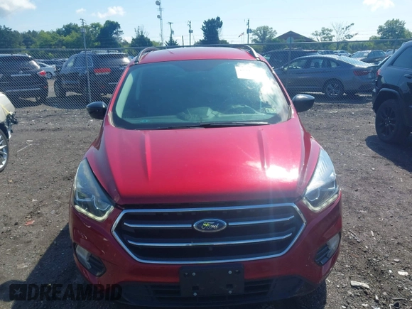 2017 Ford Escape SE z VIN 1FMCU9GD4HUA10240, wystawiony jako IAAI lot #42392522 z przebiegiem 82 325 mil mil oraz . Historia ofert i sprzedaży dostępna na DreamBid. Obrazek 12.
