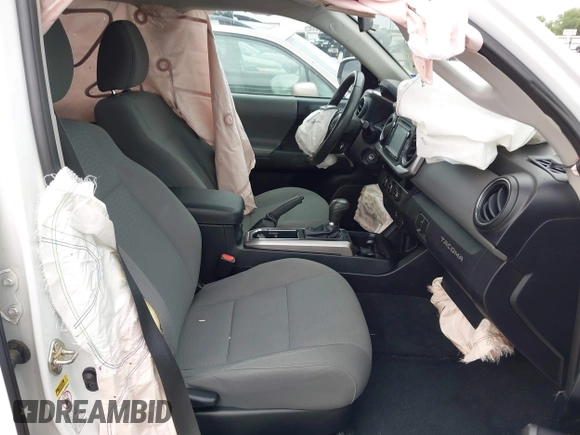 2016 Toyota Tacoma SR5 z VIN 5TFAZ5CN5GX018977, wystawiony jako IAAI lot #42303122 z przebiegiem 99 545 mil mil oraz . Historia ofert i sprzedaży dostępna na DreamBid. Obrazek 5.