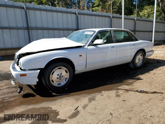 1996 Jaguar XJ with VIN SAJHX1747TC767829, listed as a Copart auction lot 76677444 with Not provided miles and Salvage title. Bid and sale history available at DreamBid. Image 1.