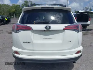 2016 Toyota RAV4 LE with VIN JTMZFREV2GJ096782, listed as a IAAI auction lot 41945319 with 76,866 mi miles. Bid and sale history available at carsss.com. Image 17.
