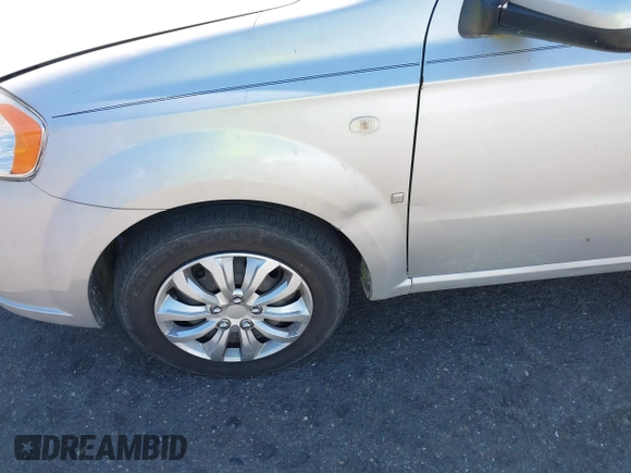 2007 Chevrolet Aveo LS with VIN KL1TD56617B098732, listed as a IAAI auction lot 41889243 with 115,426 mi miles and . Bid and sale history available at DreamBid. Image 6.