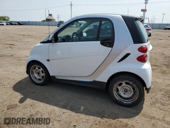 2014 Smart fortwo Pure z VIN WMEEJ3BA5EK779399, wystawiony jako Copart lot #59279785 z przebiegiem 117 204 mil mil oraz Czysty tytuł • Clean title. Historia ofert i sprzedaży dostępna na DreamBid. Obrazek 2.