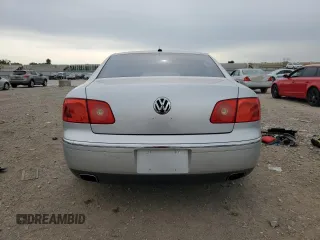 2004 Volkswagen Phaeton V8 z VIN WVWAF63D848008231, wystawiony jako Copart lot #58247645 z przebiegiem 130 457 mil mil oraz Czysty tytuł • Clean title. Historia ofert i sprzedaży dostępna na DreamBid. Obrazek 6.