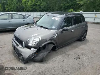 2013 MINI Countryman S with VIN WMWZC3C53DWP24112, listed as a Copart auction lot 63372195 with 147,865 mi miles and Salvage title. Bid and sale history available at DreamBid. Image 1.