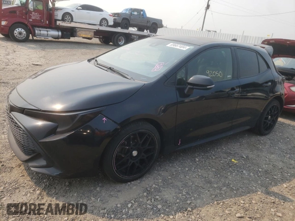 2019 Toyota Corolla Hatchback SE with VIN JTNK4RBE5K3063487, listed as a Copart auction lot 69667404 with 92,050 mi miles and Salvage Title. Bid and sale history available at carsss.com. Image 1.