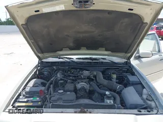 2004 Mercury Grand Marquis LS Premium z VIN 2MEFM75WX4X607033, wystawiony jako IAAI lot #42332543 z przebiegiem 179 297 mil mil oraz . Historia ofert i sprzedaży dostępna na DreamBid. Obrazek 10.
