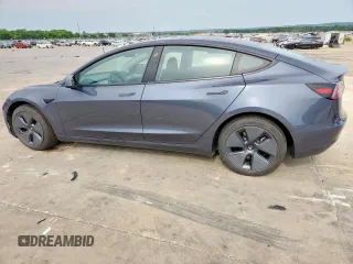2023 Tesla Model 3 with VIN 5YJ3E1EA1PF468627, listed as a Copart auction lot 57285575 with 5,952 mi miles and Salvage title. Bid and sale history available at DreamBid. Image 2.