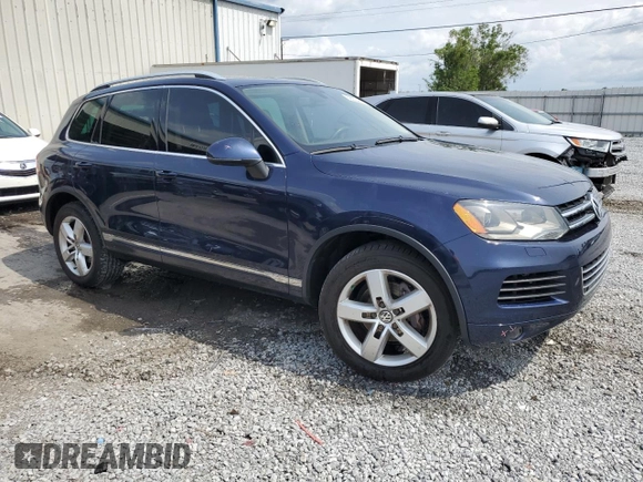 2013 Volkswagen Touareg Lux с VIN WVGEF9BP0DD002456, выставлен на аукционе Copart как лот 56034435 с пробегом 131 412 миль миль и Списание • Salvage title. История ставок и продаж доступна на DreamBid. Изображение 4.