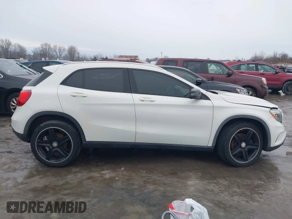 2015 Mercedes-Benz GLA 250 z VIN WDCTG4GB7FJ036868, wystawiony jako IAAI lot #41683576 z przebiegiem 100 975 mil mil oraz . Historia ofert i sprzedaży dostępna na DreamBid. Obrazek 14.