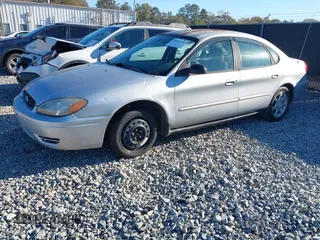 2004 Ford Taurus SES with VIN 1FAFP55U74A157139, listed as a IAAI auction lot 40979572 with 203,935 mi miles and . Bid and sale history available at DreamBid. Image 2.