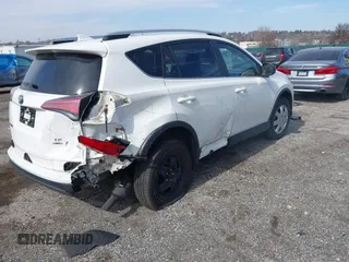 2016 Toyota RAV4 LE with VIN JTMBFREV9GJ097512, listed as a IAAI auction lot 41840323 with 73,400 mi miles. Bid and sale history available at carsss.com. Image 4.