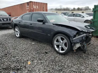 2010 Dodge Charger R/T with VIN 2B3CA5CT3AH172325, listed as a Copart auction lot 50302885 with 257,870 mi miles and Salvage Title. Bid and sale history available at carsss.com. Image 4.