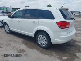 2013 Dodge Journey SE z VIN 3C4PDCAB1DT715883, wystawiony jako IAAI lot #42188089 z przebiegiem 111 905 mil mil oraz . Historia ofert i sprzedaży dostępna na DreamBid. Obrazek 3.