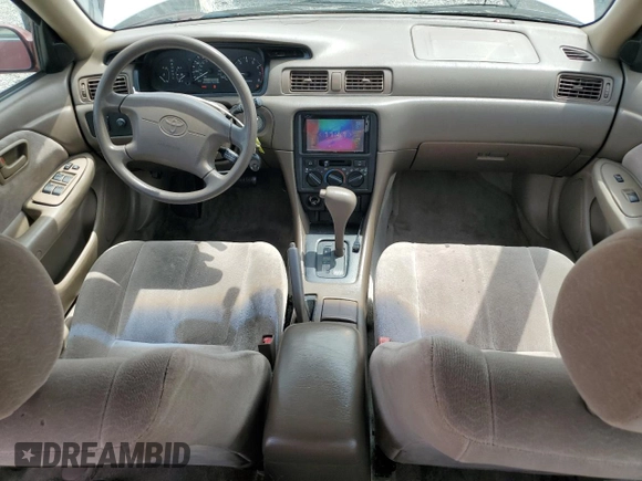 1999 Toyota Camry LE z VIN JT2BF22K8X0181675, wystawiony jako Copart lot #55057875 z przebiegiem 184 657 mil mil oraz Szkoda całkowita • Salvage title. Historia ofert i sprzedaży dostępna na DreamBid. Obrazek 8.
