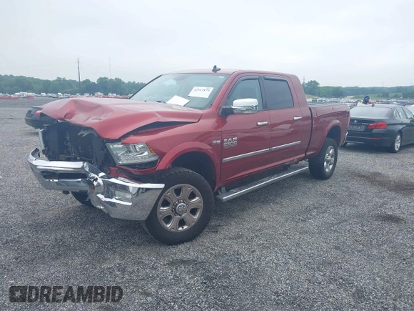 2014 Ram 2500 Laramie with VIN 3C6UR5NJ1EG276591, listed as a IAAI auction lot 42517879 with 145,466 mi miles and . Bid and sale history available at DreamBid. Image 2.