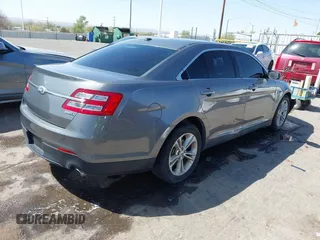 2013 Ford Taurus SEL with VIN 1FAHP2E81DG113242, listed as a IAAI auction lot 41952486 with 169,369 mi miles. Bid and sale history available at carsss.com. Image 4.