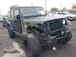 2015 Jeep Wrangler Unlimited Sport with VIN 1C4BJWDG1FL760333, listed as a IAAI auction lot 42465951 with 82,617 mi miles and . Bid and sale history available at DreamBid. Image 1.