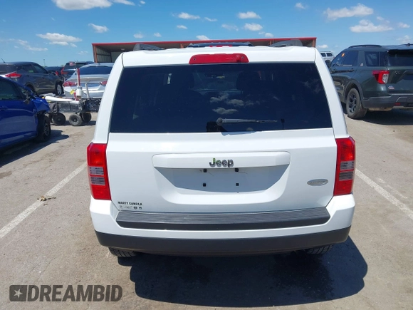 2014 Jeep Patriot Latitude z VIN 1C4NJPFB1ED505288, wystawiony jako IAAI lot #42118356 z przebiegiem 146 615 mil mil oraz . Historia ofert i sprzedaży dostępna na DreamBid. Obrazek 17.