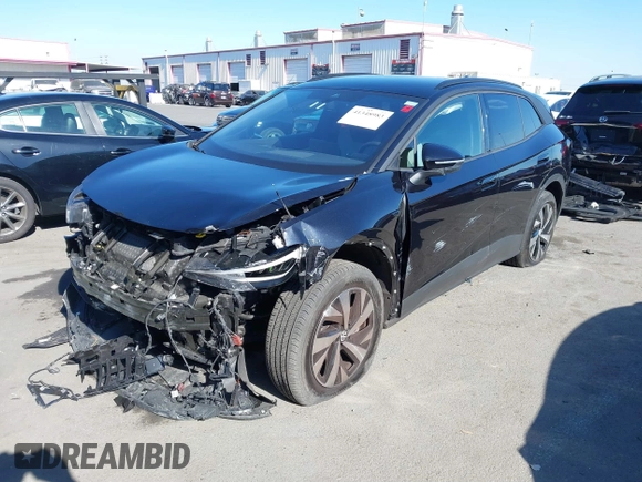 2023 Volkswagen ID.4 Pro z VIN 1V2DNPE85PC028748, wystawiony jako IAAI lot #41348983 z przebiegiem 7 434 mil mil oraz . Historia ofert i sprzedaży dostępna na DreamBid. Obrazek 2.