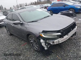 2022 Honda Insight Touring with VIN 19XZE4F90NE013173, listed as a IAAI auction lot 41572987 with 39,273 mi miles and . Bid and sale history available at carsss.com. Image 1.