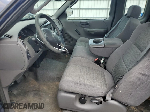 2004 Ford F-150 XL with VIN 2FTRX17234CA91750, listed as a Copart auction lot 60951485 with 243,621 mi miles and Salvage title. Bid and sale history available at DreamBid. Image 7.