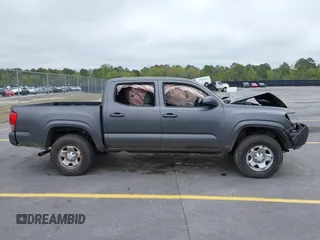 2017 Toyota Tacoma SR z VIN 5TFAX5GN7HX090832, wystawiony jako IAAI lot #41903374 z przebiegiem 234 499 mil mil oraz . Historia ofert i sprzedaży dostępna na DreamBid. Obrazek 13.
