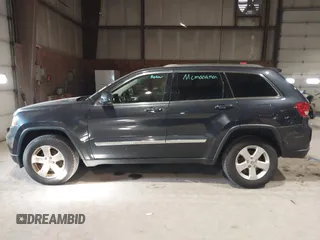 2013 Jeep Grand Cherokee Laredo with VIN 1C4RJFAG9DC583269, listed as a IAAI auction lot 41241085 with 147,995 mi miles. Bid and sale history available at carsss.com. Image 14.