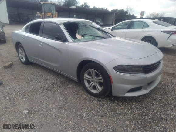 2021 Dodge Charger SXT with VIN 2C3CDXBG5MH642871, listed as a IAAI auction lot 41509420 with 100,789 mi miles. Bid and sale history available at carsss.com. Image 1.