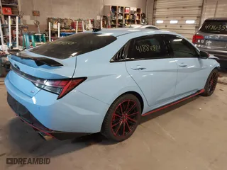 2022 Hyundai Elantra N with VIN KMHLW4AK9NU003302, listed as a IAAI auction lot 41884801 with 39,415 mi miles. Bid and sale history available at carsss.com. Image 4.