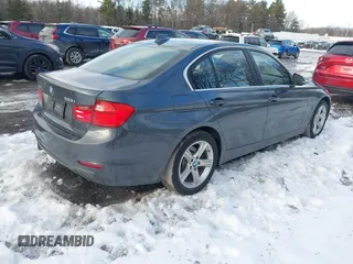 2015 BMW 3 Series 328i xDrive with VIN WBA3B5G55FNS14903, listed as a IAAI auction lot 41497975 with 62,009 mi miles. Bid and sale history available at carsss.com. Image 4.