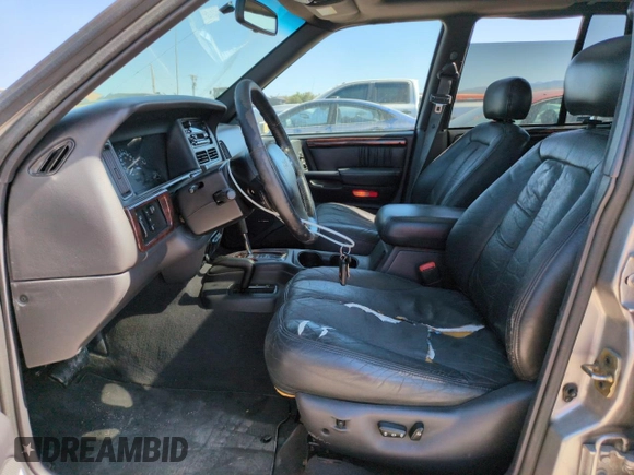 1998 Jeep Grand Cherokee Limited z VIN 1J4GZ88Z8WC306919, wystawiony jako Copart lot #61505725 z przebiegiem 195 329 mil mil oraz Czysty tytuł • Clean title. Historia ofert i sprzedaży dostępna na DreamBid. Obrazek 7.