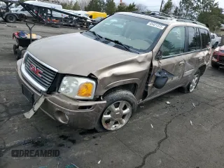 2002 GMC Envoy SLT with VIN 1GKDT13SX22353269, listed as a Copart auction lot 45421375 with 212,027 mi miles and Salvage Title. Bid and sale history available at carsss.com. Image 1.