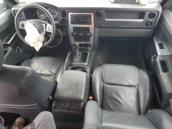 2010 Jeep Commander Sport with VIN 1J4RG4GKXAC137037, listed as a Copart auction lot 43152605 with 143,700 mi miles and Salvage Title. Bid and sale history available at carsss.com. Image 8.