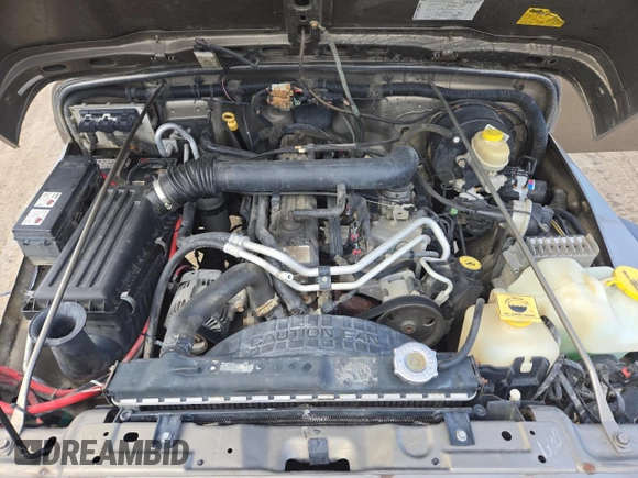 2004 Jeep Wrangler Sahara with VIN 1J4FA59S64P774768, listed as a Copart auction lot 49868895 with 120,800 mi miles and Salvage Title. Bid and sale history available at DreamBid. Image 11.