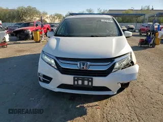 2020 Honda Odyssey Touring with VIN 5FNRL6H8XLB007622, listed as a Copart auction lot 76297494 with 83,452 mi miles and Salvage Title. Bid and sale history available at DreamBid. Image 12.