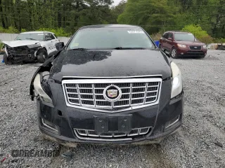 2014 Cadillac XTS Livery z VIN 2G61U5S33E9141464, wystawiony jako Copart lot #52071545 z przebiegiem 231 098 mil mil oraz Tytuł czysty. Historia ofert i sprzedaży dostępna na DreamBid. Obrazek 5.
