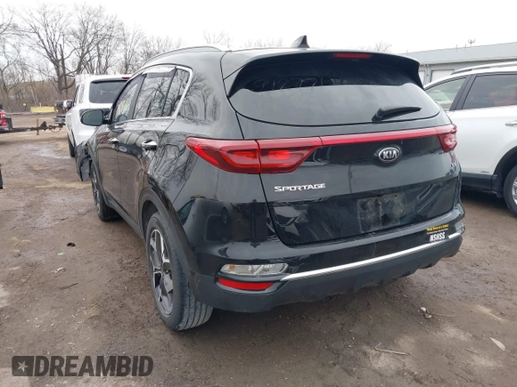 2021 Kia Sportage EX with VIN KNDPN3AC8M7912771, listed as a IAAI auction lot 41737909 with 31,614 mi miles and . Bid and sale history available at DreamBid. Image 3.