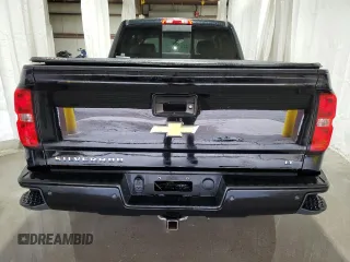 2017 Chevrolet Silverado 1500 LT with VIN 1GCVKREC0HZ141018, listed as a Copart auction lot 52708255 with 96,790 mi miles and Salvage Title. Bid and sale history available at DreamBid. Image 6.