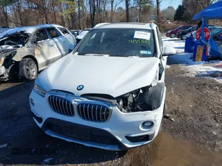 2017 BMW X1 xDrive28i with VIN WBXHT3Z36H4A52364, listed as a IAAI auction lot 41397667 with 61,960 mi miles. Bid and sale history available at carsss.com. Image 12.