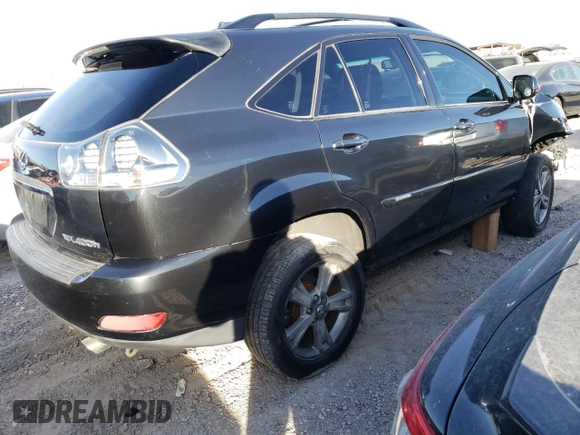 2007 Lexus RX 400h z VIN JTJGW31U172005381, wystawiony jako Copart lot #85118324 z przebiegiem 145 757 mil mil oraz Szkody całkowita. Historia ofert i sprzedaży dostępna na DreamBid. Obrazek 3.