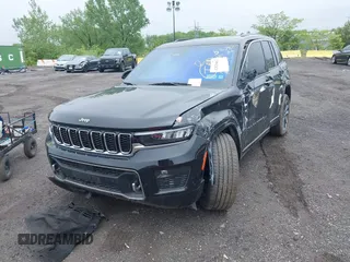 2023 Jeep Grand Cherokee Overland with VIN 1C4RJHDG2PC516797, listed as a IAAI auction lot 42026063 with 25,808 mi miles and . Bid and sale history available at DreamBid. Image 2.