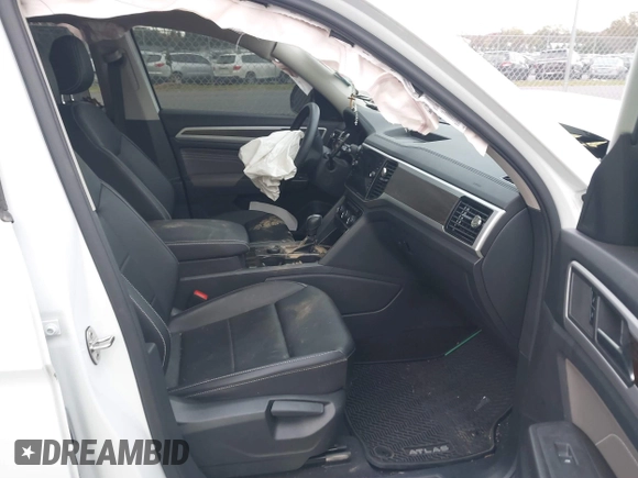 2023 Volkswagen Atlas SE with VIN 1V2KP2CA9PC556898, listed as a IAAI auction lot 40714688 with 53,598 mi miles and . Bid and sale history available at DreamBid. Image 5.