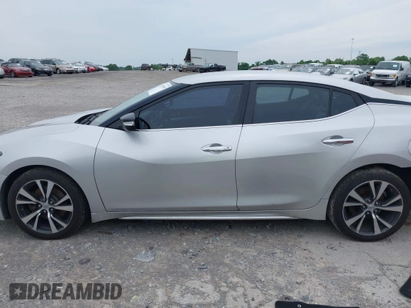 2016 Nissan Maxima SR with VIN 1N4AA6AP8GC407031, listed as a IAAI auction lot 42453395 with 204,155 mi miles and . Bid and sale history available at DreamBid. Image 14.