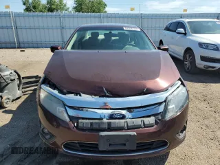 2012 Ford Fusion SE z VIN 3FAHP0HA0CR193143, wystawiony jako Copart lot #62696565 z przebiegiem 150 562 mil mil oraz Szkoda całkowita • Salvage title. Historia ofert i sprzedaży dostępna na DreamBid. Obrazek 5.