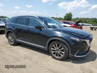 2018 Mazda CX-9 Grand Touring with VIN JM3TCBDY4J0232657, listed as a Copart auction lot 60405055 with 131,924 mi miles and Salvage title. Bid and sale history available at DreamBid. Image 4.