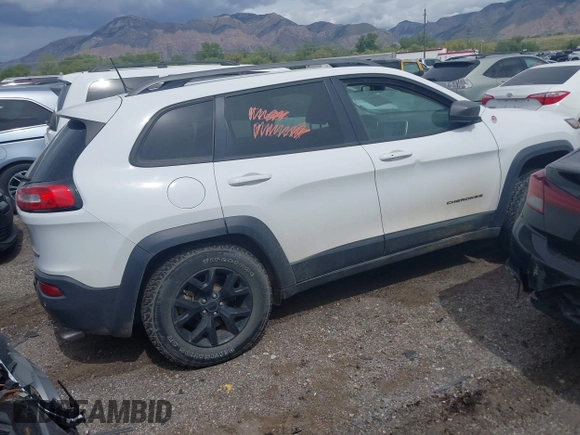 2018 Jeep Cherokee Trailhawk with VIN 1C4PJMBX3JD548761, listed as a IAAI auction lot 42107376 with 148,525 mi miles and . Bid and sale history available at DreamBid. Image 4.