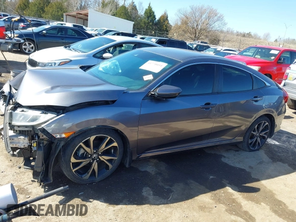 2019 Honda Civic Sport with VIN 19XFC2F82KE019704, listed as a IAAI auction lot 41770051 with 90,011 mi miles and . Bid and sale history available at DreamBid. Image 14.