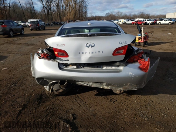 2015 Infiniti Q40 with VIN JN1CV6AR4FM520186, listed as a Copart auction lot 87392404 with 67,775 mi miles and Salvage Title. Bid and sale history available at DreamBid. Image 6.