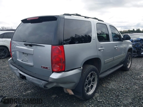 2012 GMC Yukon SLT with VIN 1GKS2CE03CR324366, listed as a IAAI auction lot 41473131 with 161,847 mi miles. Bid and sale history available at carsss.com. Image 4.